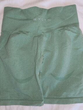 NVGTN BIKER SHORTS 
size small
Light green